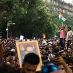 confrontos-na-india-entre-policia-e-jovens-que-exigem-demissoes-no-governo